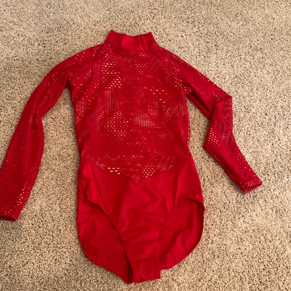 Long sleeved red leotard. Fully lined with beige